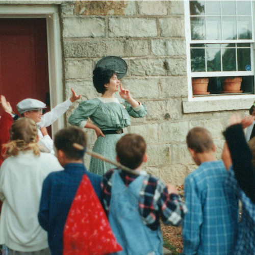 Miss Welstead outside the one room schoolhouse